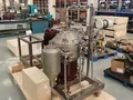 Саморазгружающаяся тарельчатая центрифуга